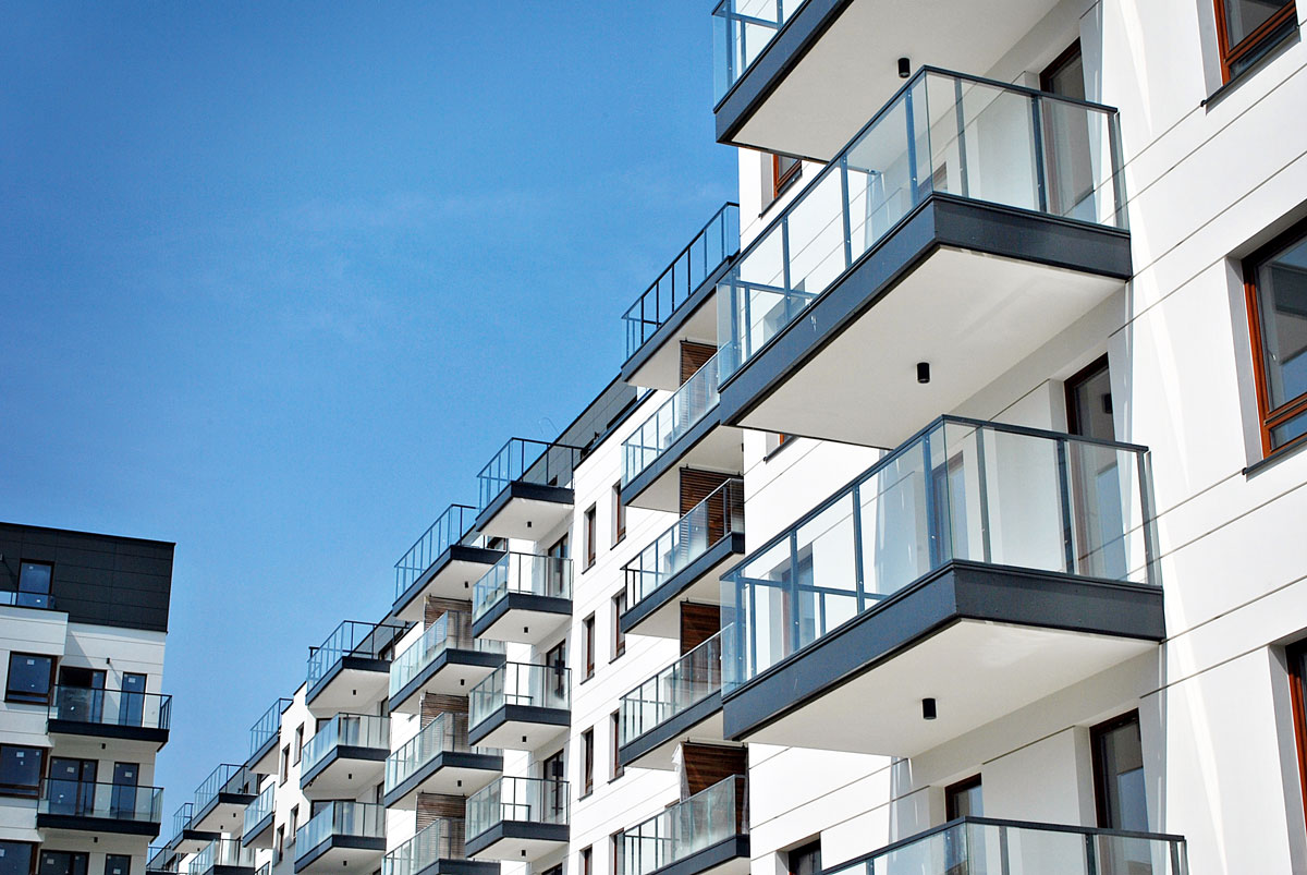 Multifamily'-680603734 Multi Family Home Exterior Balcony White Building